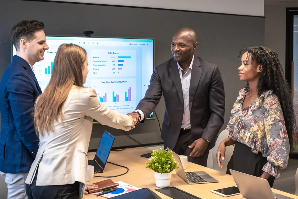 Business man shake hands with partner
